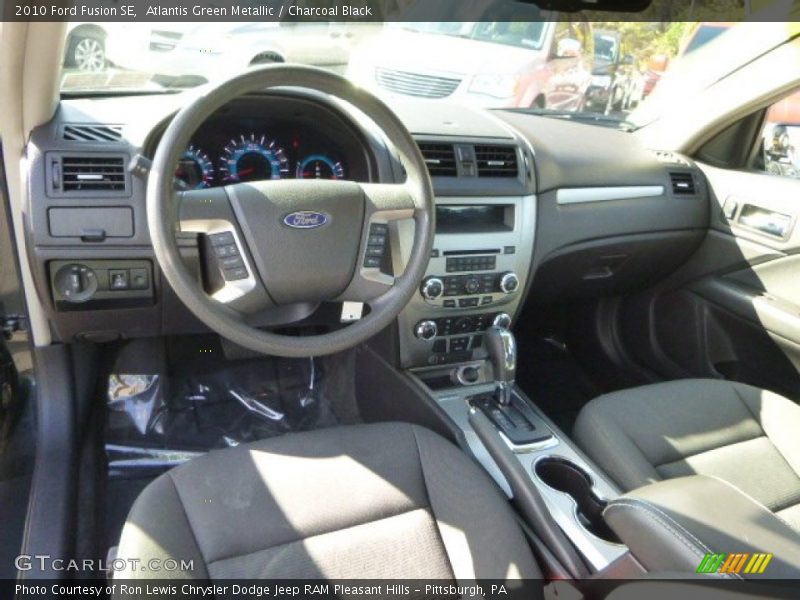 Atlantis Green Metallic / Charcoal Black 2010 Ford Fusion SE