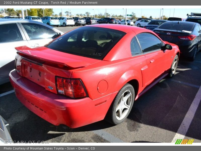 Torch Red / Medium Parchment 2002 Ford Mustang GT Coupe
