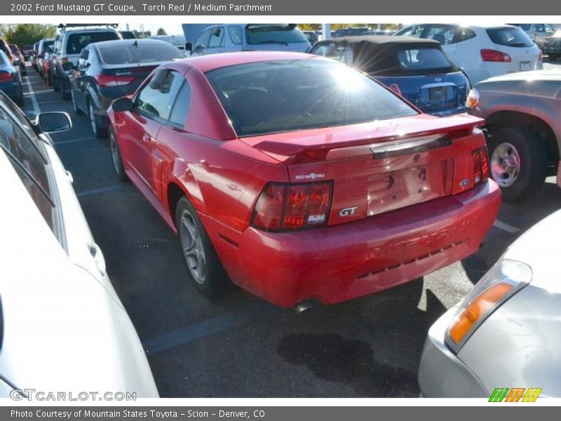 Torch Red / Medium Parchment 2002 Ford Mustang GT Coupe