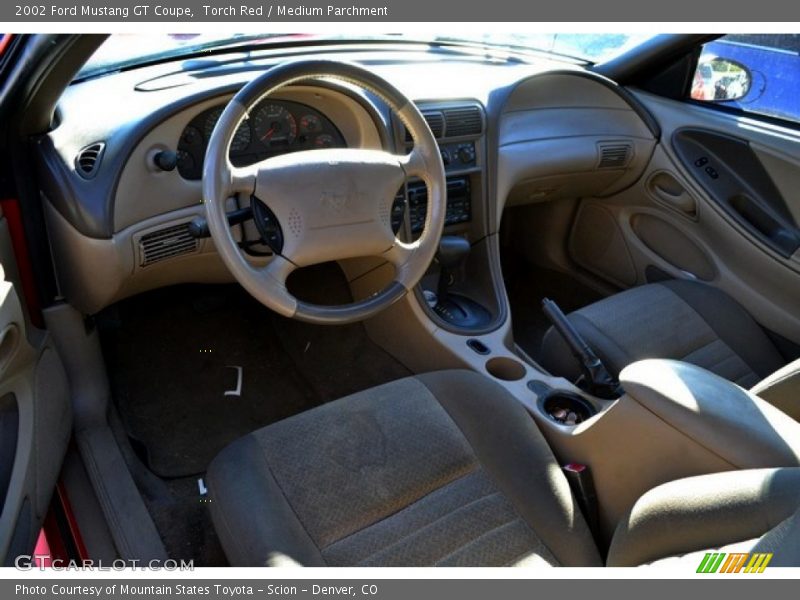 Torch Red / Medium Parchment 2002 Ford Mustang GT Coupe