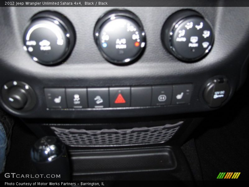 Black / Black 2012 Jeep Wrangler Unlimited Sahara 4x4