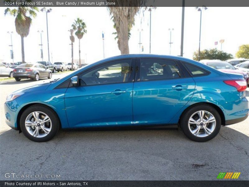 Blue Candy / Medium Light Stone 2014 Ford Focus SE Sedan