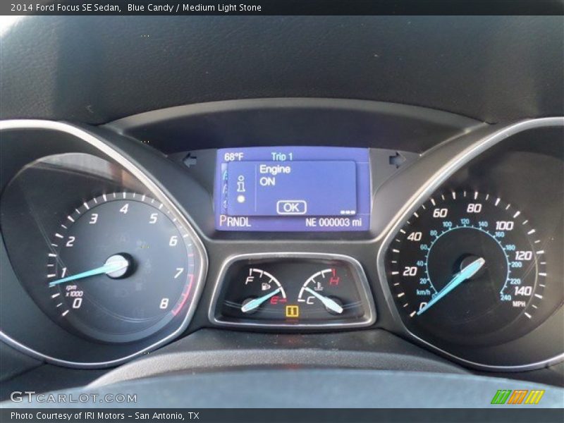Blue Candy / Medium Light Stone 2014 Ford Focus SE Sedan