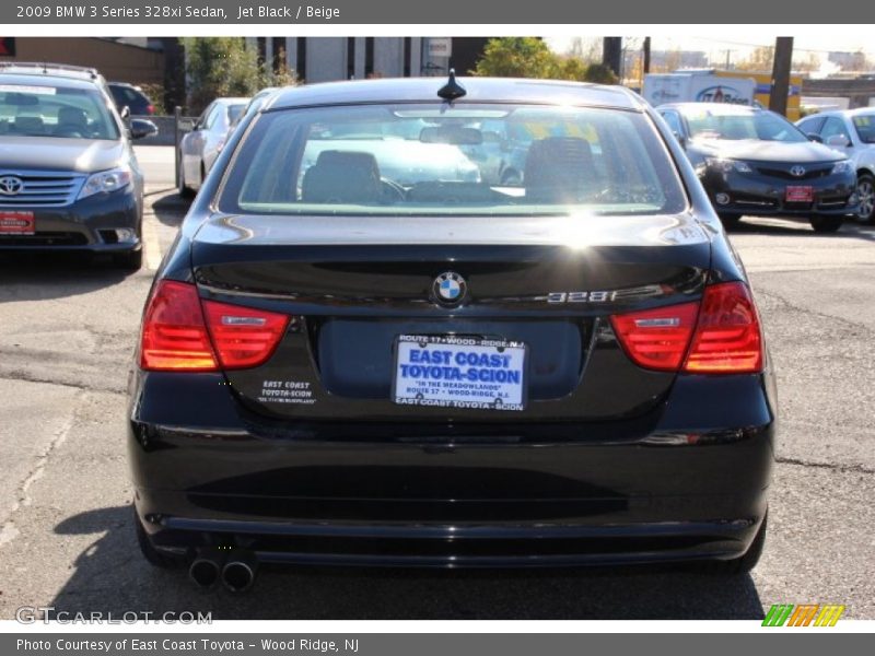 Jet Black / Beige 2009 BMW 3 Series 328xi Sedan