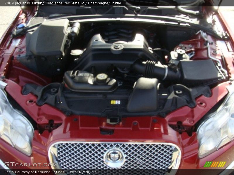 Radiance Red Metallic / Champagne/Truffle 2009 Jaguar XF Luxury