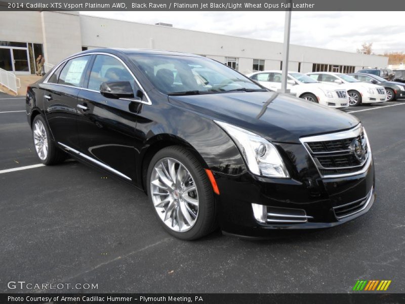Front 3/4 View of 2014 XTS Vsport Platinum AWD