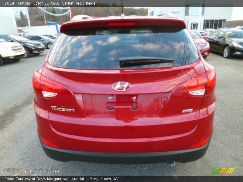 Garnet Red / Beige 2014 Hyundai Tucson SE AWD