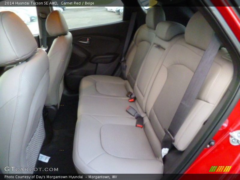 Garnet Red / Beige 2014 Hyundai Tucson SE AWD