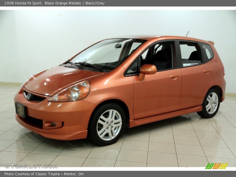 Blaze Orange Metallic / Black/Grey 2008 Honda Fit Sport