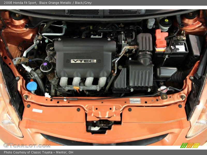 Blaze Orange Metallic / Black/Grey 2008 Honda Fit Sport