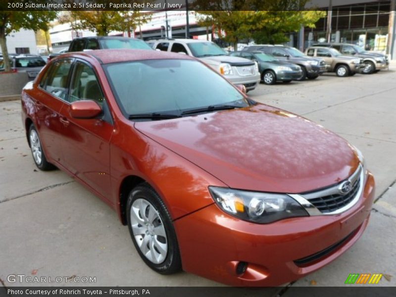 Paprika Red Pearl / Ivory 2009 Subaru Impreza 2.5i Sedan
