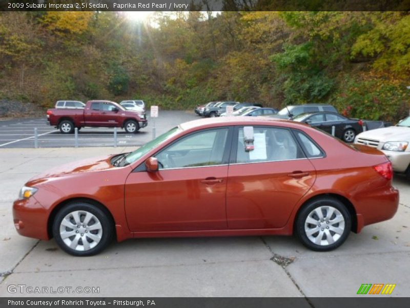 Paprika Red Pearl / Ivory 2009 Subaru Impreza 2.5i Sedan