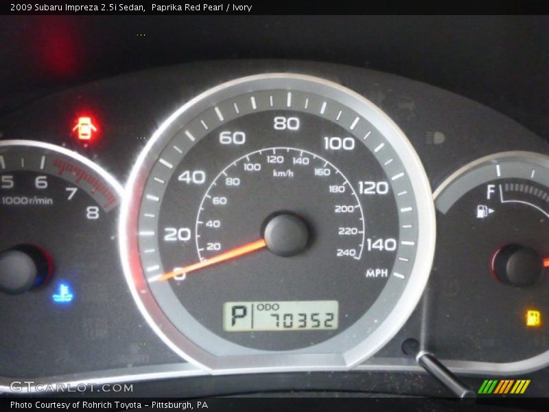Paprika Red Pearl / Ivory 2009 Subaru Impreza 2.5i Sedan