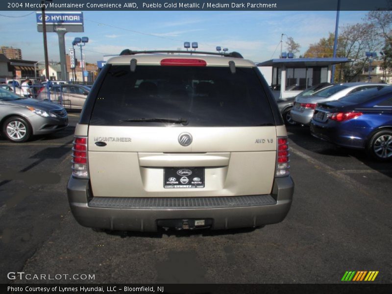 Pueblo Gold Metallic / Medium Dark Parchment 2004 Mercury Mountaineer Convenience AWD