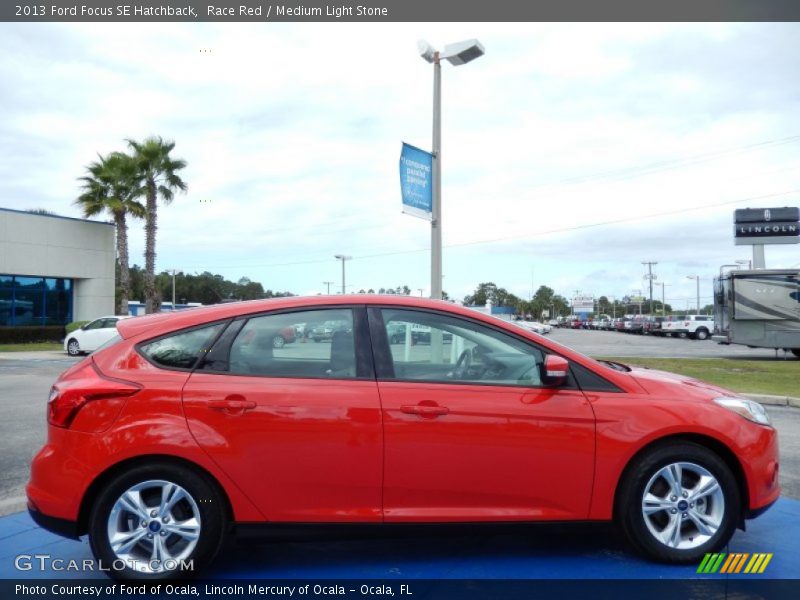 Race Red / Medium Light Stone 2013 Ford Focus SE Hatchback