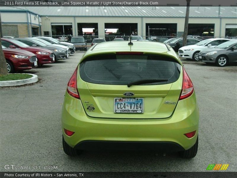 Lime Squeeze Metallic / Light Stone/Charcoal Black Cloth 2011 Ford Fiesta SE Hatchback