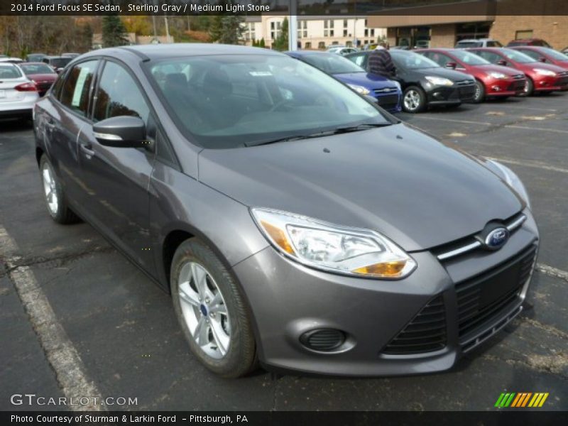 Sterling Gray / Medium Light Stone 2014 Ford Focus SE Sedan