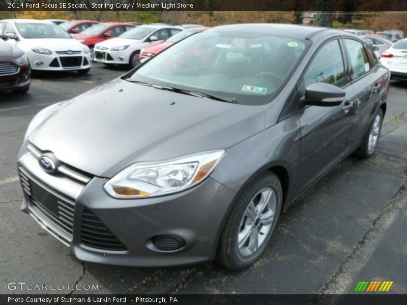 Sterling Gray / Medium Light Stone 2014 Ford Focus SE Sedan