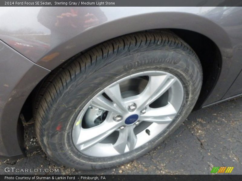 Sterling Gray / Medium Light Stone 2014 Ford Focus SE Sedan