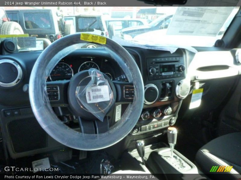 Black / Black 2014 Jeep Wrangler Unlimited Rubicon 4x4