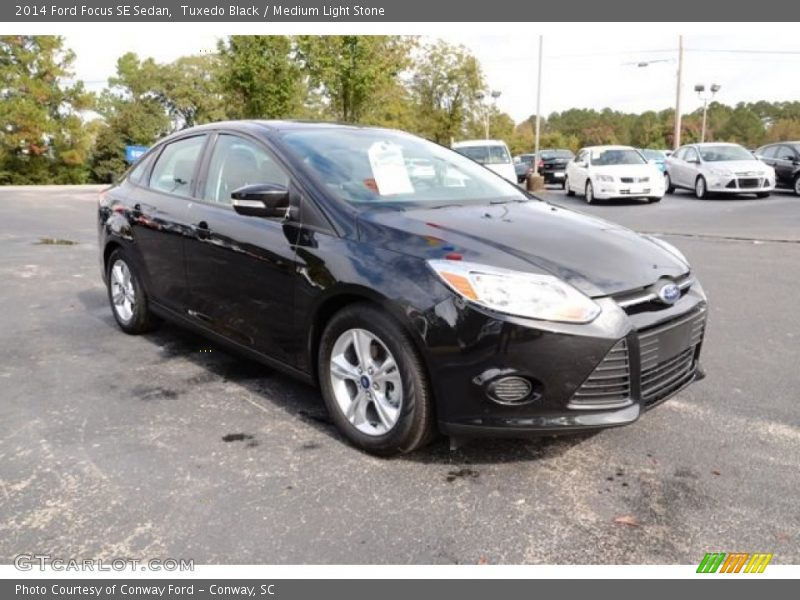 Tuxedo Black / Medium Light Stone 2014 Ford Focus SE Sedan