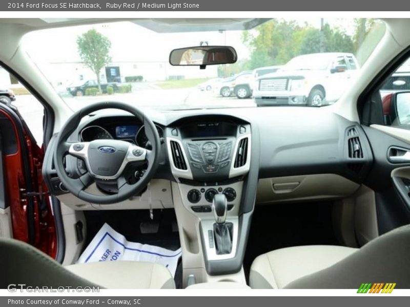 Ruby Red / Medium Light Stone 2014 Ford Focus SE Hatchback