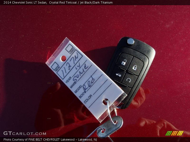 Crystal Red Tintcoat / Jet Black/Dark Titanium 2014 Chevrolet Sonic LT Sedan