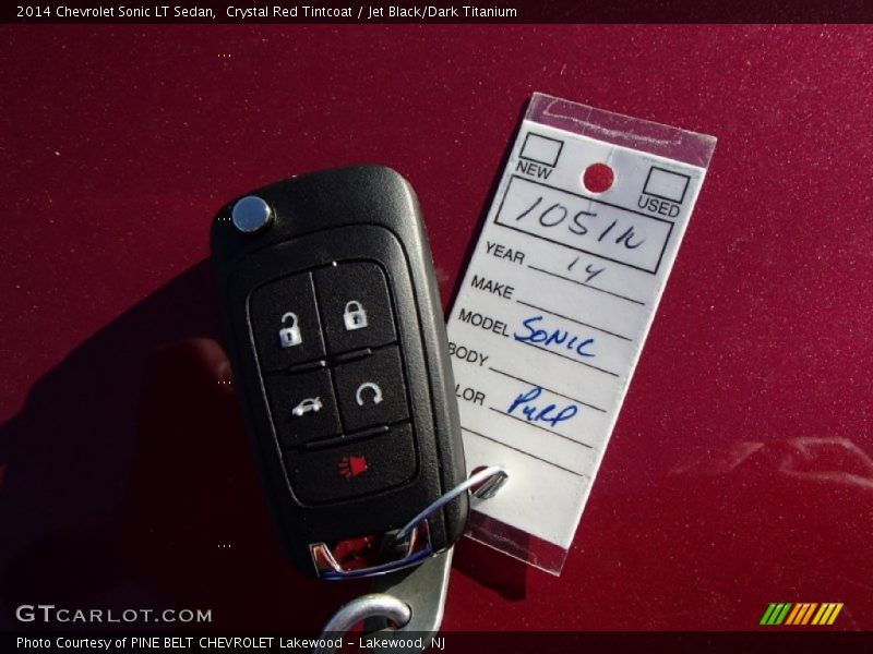 Crystal Red Tintcoat / Jet Black/Dark Titanium 2014 Chevrolet Sonic LT Sedan