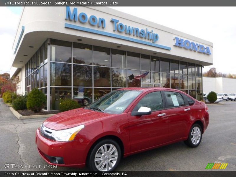 Sangria Red Metallic / Charcoal Black 2011 Ford Focus SEL Sedan