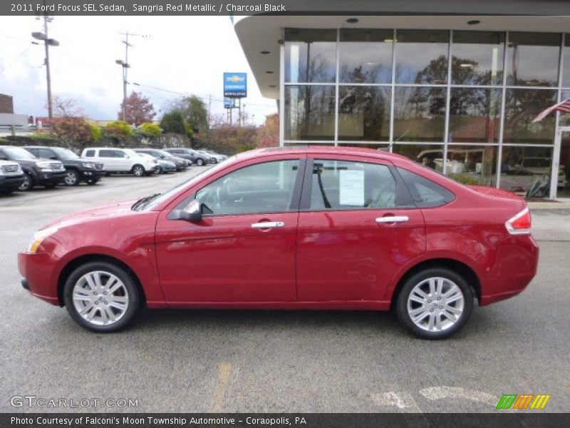 Sangria Red Metallic / Charcoal Black 2011 Ford Focus SEL Sedan