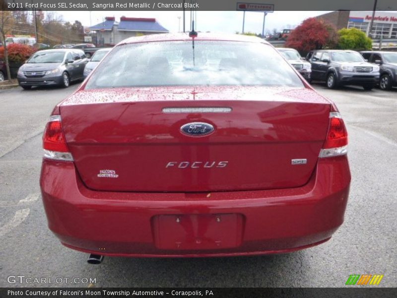 Sangria Red Metallic / Charcoal Black 2011 Ford Focus SEL Sedan