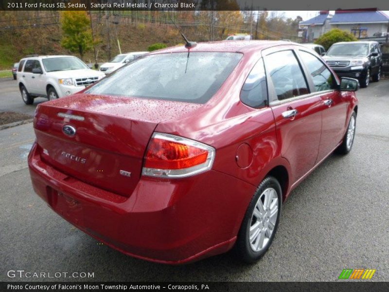 Sangria Red Metallic / Charcoal Black 2011 Ford Focus SEL Sedan