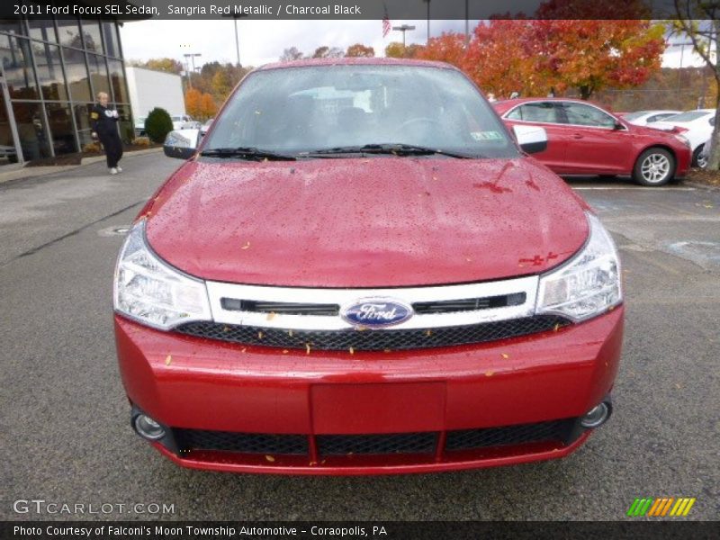 Sangria Red Metallic / Charcoal Black 2011 Ford Focus SEL Sedan