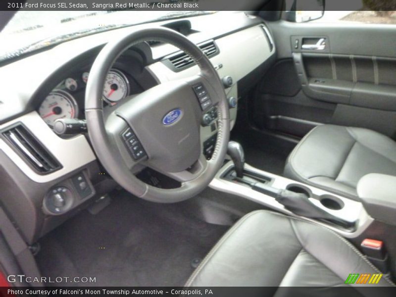 Sangria Red Metallic / Charcoal Black 2011 Ford Focus SEL Sedan