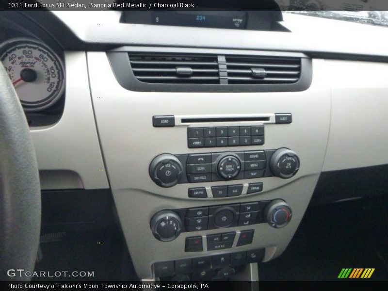 Sangria Red Metallic / Charcoal Black 2011 Ford Focus SEL Sedan