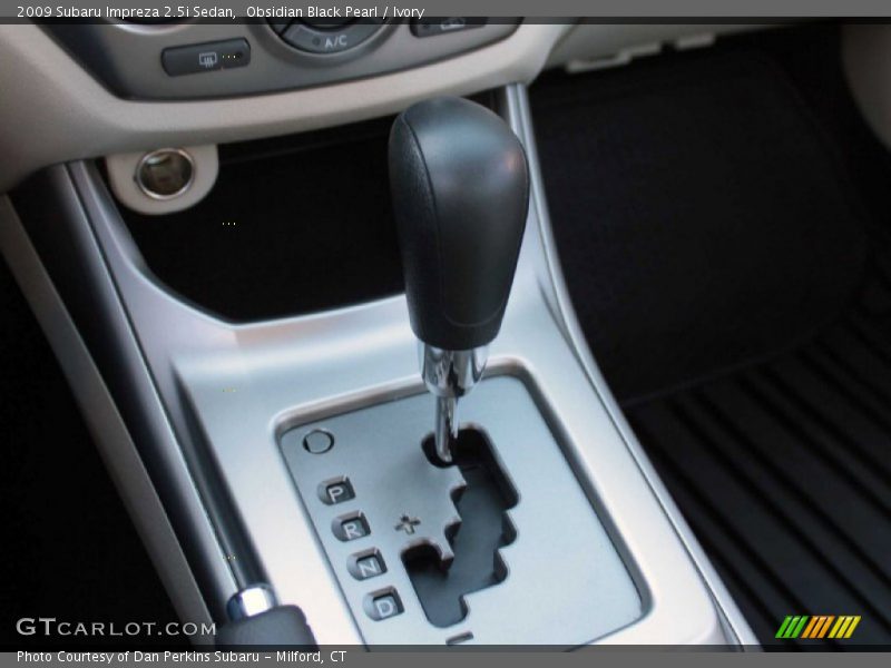 Obsidian Black Pearl / Ivory 2009 Subaru Impreza 2.5i Sedan