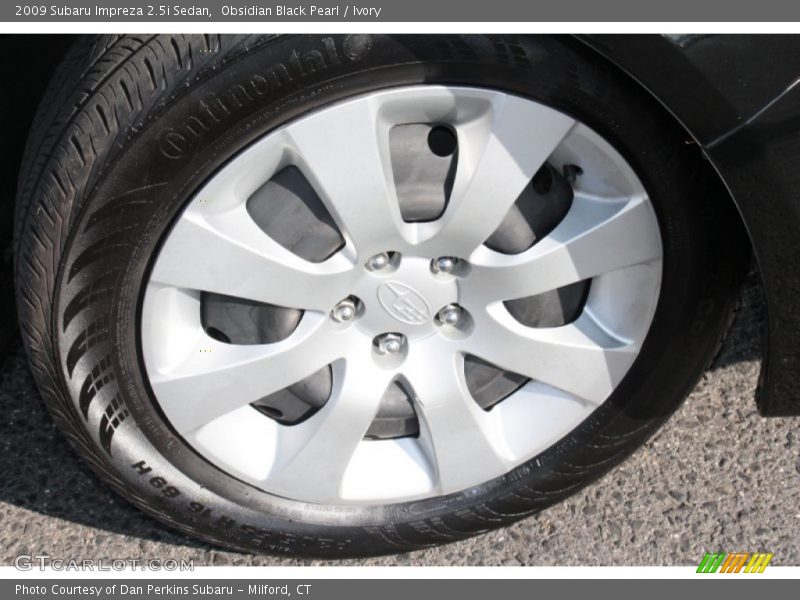 Obsidian Black Pearl / Ivory 2009 Subaru Impreza 2.5i Sedan