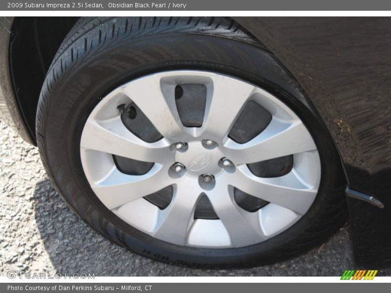Obsidian Black Pearl / Ivory 2009 Subaru Impreza 2.5i Sedan