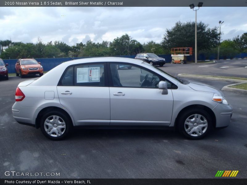 Brilliant Silver Metallic / Charcoal 2010 Nissan Versa 1.8 S Sedan
