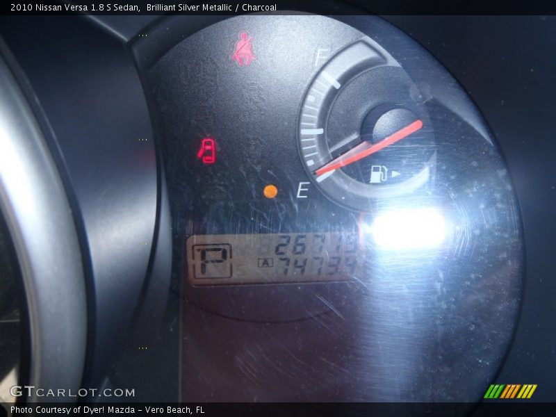 Brilliant Silver Metallic / Charcoal 2010 Nissan Versa 1.8 S Sedan