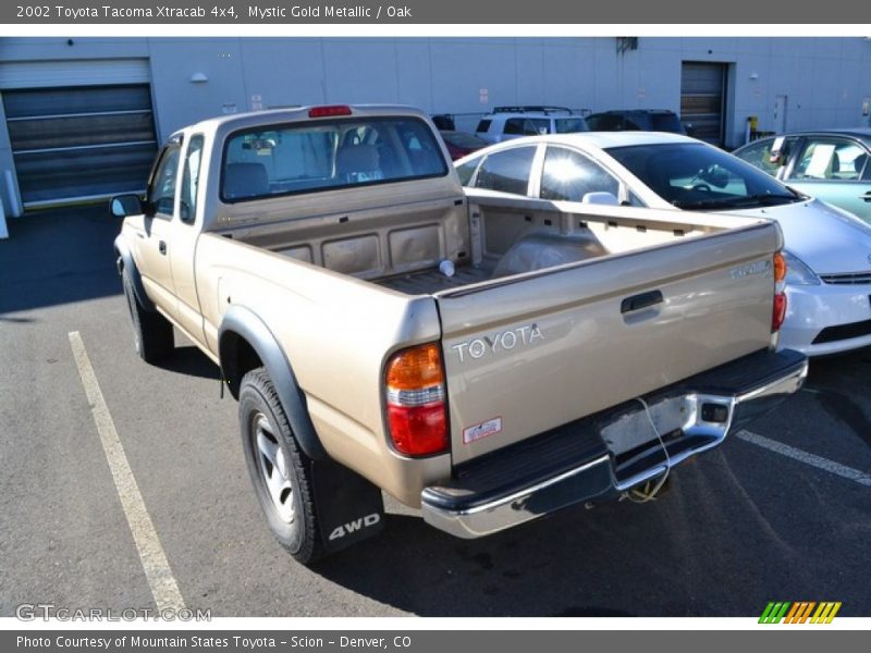 Mystic Gold Metallic / Oak 2002 Toyota Tacoma Xtracab 4x4