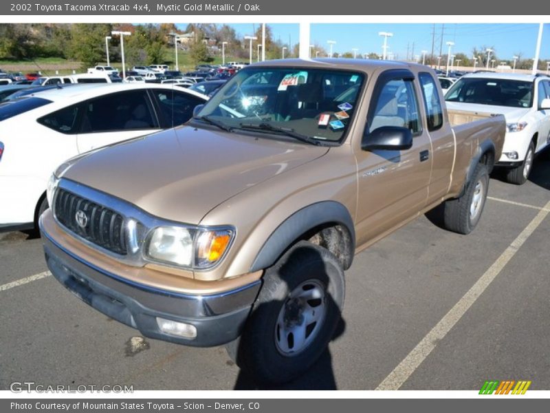 Mystic Gold Metallic / Oak 2002 Toyota Tacoma Xtracab 4x4