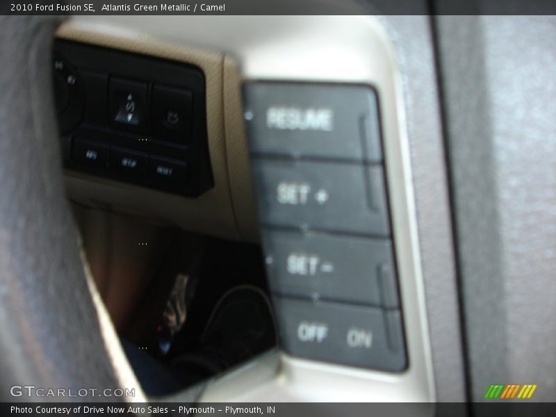 Atlantis Green Metallic / Camel 2010 Ford Fusion SE