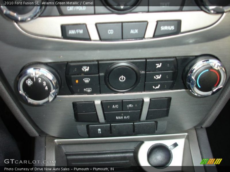 Atlantis Green Metallic / Camel 2010 Ford Fusion SE