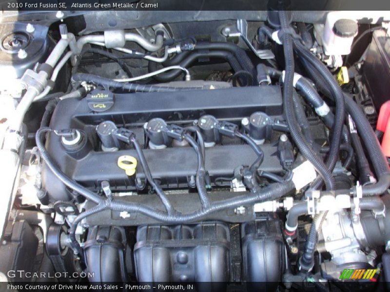 Atlantis Green Metallic / Camel 2010 Ford Fusion SE