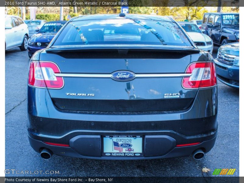 Atlantis Green Metallic / Charcoal Black 2010 Ford Taurus SHO AWD