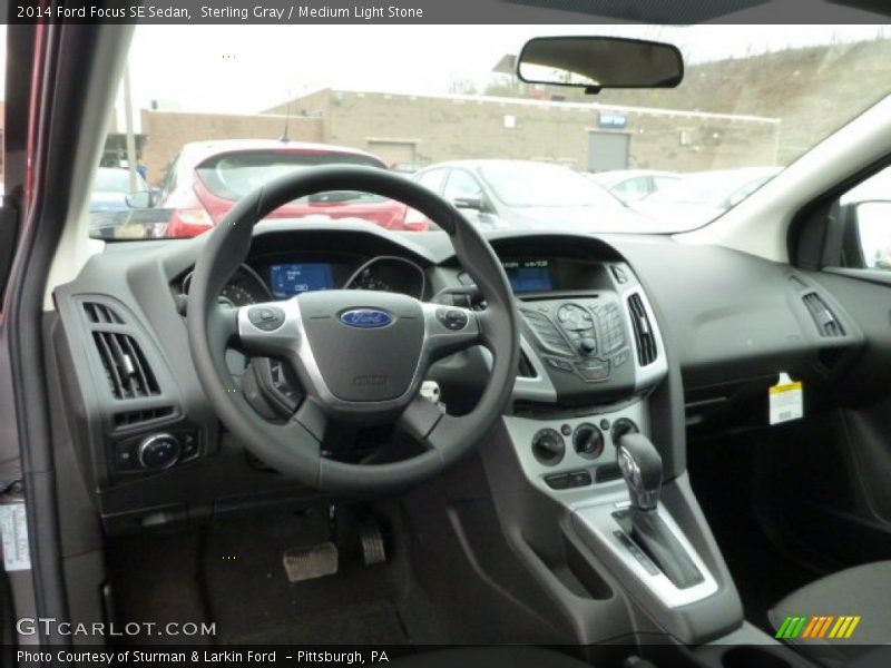 Sterling Gray / Medium Light Stone 2014 Ford Focus SE Sedan