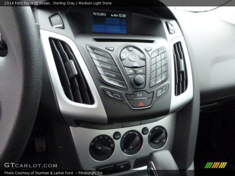 Sterling Gray / Medium Light Stone 2014 Ford Focus SE Sedan