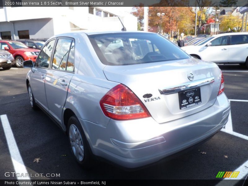 Brilliant Silver Metallic / Charcoal 2010 Nissan Versa 1.8 S Sedan