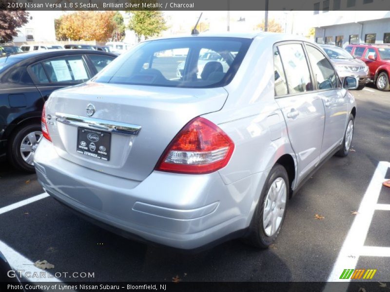 Brilliant Silver Metallic / Charcoal 2010 Nissan Versa 1.8 S Sedan